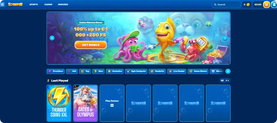 The Spinfin Casino lobby shows the welcome bonus, game categories and slot titles